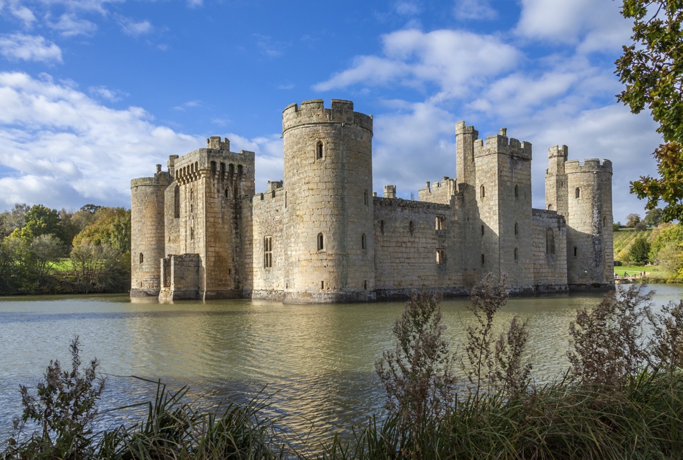 castle surrounded by a large moat